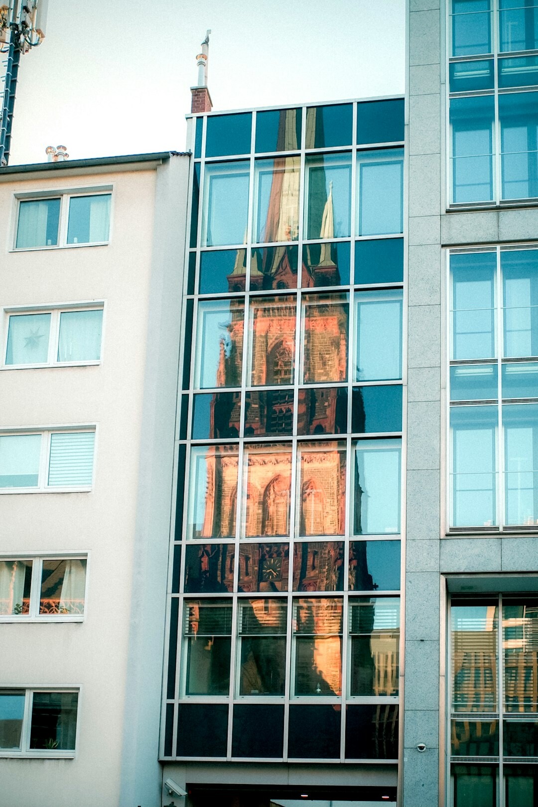 Modern glass office building facade in a European city